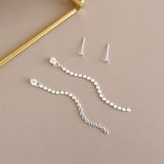 Earring Size: 2.25mm * 60mm Metal Material: Solid 925 Sterling Silver Metal Electroplating: Rhodium Total Weight: 1.65g Anniversay Gifts, Flat Beads, Elegant Flats, Tarnished Jewelry, Dangling Earrings, Stunning Earrings, Bead Jewellery, Metal Material, Elegant Earrings