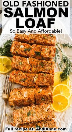 an advertisement for old fashioned salmon loaf on a plate with lemons and rosemary garnish