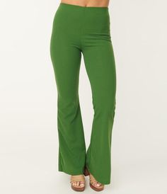 Retro style never looked so easy, ladies! These charming pants are crafted in a green woven stretch blend and boast a fabulous high waist silhouette. The elastic waistband cinches your form while the flare legs drop to your feet!Available in sizes S-L while supplies last. Green Flare Pants, The Flare, Green Bottom, Spring Trends, Model Pictures, Flare Pants, Bottoms Pants, Retro Style, Unique Vintage