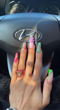 Swirl nails, flower nail, groovy, bright, swirly nails, flower nails, bright Festival Nails Coffin, Swirly Flower Nails, Neon Nails With Flowers, Groovy Acrylic Nails, Festival Nails Acrylic, Flower Power Nail Art, Swirly Acrylic Nails, Groovy Summer Nails, Bright Flower Nails