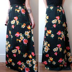 "Black floral maxi skirt by Casualaire London Design Zips up the back and has a button closure Covered in a stunning vibrant floral pattern  Measurements: Fits - medium to large Waist - 30\" Hip - 47\" Length - 41.5\" Condition - Excellent - No major visible flaws Label- Casualaire London Design  *All measurements are taken in inches. Please compare and ensure fit of item before purchase. Please feel free to contact me with any questions. Looking for more skirts? Check out these listings: https: Summer Black Maxi Skirt With Floral Print, Black Floral Print Maxi Skirt For Spring, Vintage Floral Print Long Maxi Skirt, Vintage Floral Print Maxi Skirt, Black Floral Maxi Skirt, Long Straight Skirt, Silky Maxi Dress, Flamenco Skirt, Cocktail Skirts