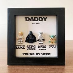 a shadow box frame with star wars characters in it that says, daddy you are