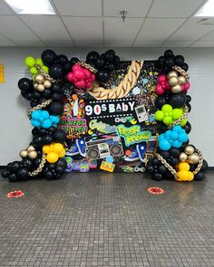 there is a large balloon display in the hallway