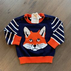 New Boy's Hatley Cotton Sweater. It Has The Face Of A Fox. Very Soft Wonderful Lightweight Fabric For Fall And Winter. Buttons At The Shoulders. All Of My Items Are Brand New From My Closed Children's Boutique And I'm Offering Them At Reasonable Prices. Please Do Not Send Silly Offers. They Will Be Ignored. Playful Knitted Cotton Tops, Playful Knitted Tops For Spring, Blue Playful Sweater For Spring, Playful Blue Sweater For Spring, Cute Blue Sweater For Playtime, Playful Blue Tops For Winter, Fun Blue Tops For Winter, Playful Blue Spring Sweater, Fun Blue Top For Fall