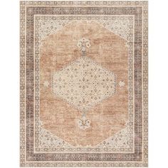 an orange and beige area rug with intricate designs on the border, in front of a white background