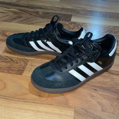 Adidas Black And White Sambas Size 4 New Wore Them One Time Only. Great Condition Like New Adidas Black Sweatshirt With Three Stripes, Adidas Black Letter Print Sweatshirt, Adidas Black And White, Black Adidas Logo Sweatshirt, Adidas Black Shorts With Built-in Shorts, Adidas Black Sweat-resistant Activewear, Adidas White, Adidas Black, Shoes Adidas