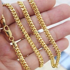 Stunning 100% solid 14k yellow gold Miami cuban chain. Perfect for everyday and every occasion. Elegant, shiny and everlasting. 14k gold will not tarnish or rust. Perfect gift. Materials: 14k gold Lenght: 20 inches Thickness: 5mm Weight: 43 grams (approximately every chain have different weight) 14k stamped Brand new UPS shipping, signature required. 💓 Briza Collections is a small family owned business that works hard on providing the best selection of Fine Solid Gold Jewelry for the best price Gold Cuban Link Necklace In 14k Gold, Yellow Gold Cuban Link Necklace As Gift, Yellow Gold Cuban Link Necklace Gift, 14k Gold Cuban Link Necklace With Curb Chain, Yellow Gold Cuban Link Necklace Tarnish Resistant, Tarnish Resistant Yellow Gold Cuban Link Necklace, Tarnish-resistant Yellow Gold Cuban Link Necklace, Yellow Gold Tarnish-resistant Cuban Link Necklace, Luxury Gold-plated Cuban Link Necklace