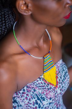 This Beaded Tie Pendant African necklace is made with the finest quality beads that bring out mother earths most beautiful colors. It is traditionally worn by Kenyan women on special occasions such as weddings. Normal Fit. One size fits all. Perfect gift for that Special Person in your life. Kenyan Women, Beaded Orange, Most Beautiful Colors, Beaded Tie, African Necklace, Maasai, Chain Styles, One Size Fits All, Beautiful Colors