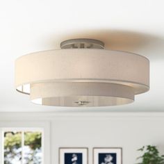 a white ceiling light in a living room