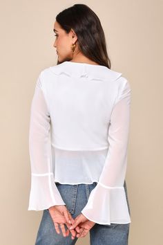 We're totally crushing on the retro cuteness of the Lulus Thriving Flirt White Chiffon Ruffled Long Sleeve Tie-Front Top! Airy woven chiffon shapes this adorable top that has long sleeves with flared cuffs and a darted bodice with a ruffle-trimmed V-neckline. Two slender ties secure at the front, atop a cropped and ruffled hem that adds a perfect Y2K vibe! Fit: This garment fits true to size. Length: Size medium measures 21.25" from shoulder to hem. Bust: Great for any cup size. Waist: Loosely F Chic Fitted Chiffon Top, White Chiffon Top For Fall, White Chiffon Top For Brunch, Fitted Chiffon Top For Day Out, Fitted Chiffon Blouse For Day Out, Top With Sleeves, Ruffled Top, Y2k Top, Ruffle Long Sleeve