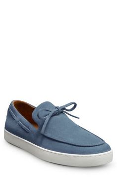 This timeless boat shoe combines with the comfort of a sneaker in this apron-toe style outfitted with leather-lined cushioning. Memory foam cushioning Leather upper and lining/rubber sole Imported Blue Leather Casual Slip-on Sneakers, Casual Blue Leather Slip-on Sneakers, Blue Leather Low-top Boat Shoes, Slip-on Low-top Boat Shoes With Rubber Sole, Blue Low-top Leather Boat Shoes, Casual Slip-on Boat Shoes With Stitched Sole, Casual Blue Suede Boat Shoes, Casual Moc Toe Slip-ons With Contrast Sole, Sporty Leather Boat Shoes With Rubber Sole