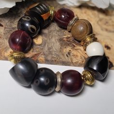 Bone, wood  and horn beads, with unique markings and details created this chunky, fly wristwear. As always one of a kind. Traditional Wooden Beaded Bracelets, Unique Brown Beaded Bracelets, Horn, Bones, Las Vegas, Jewelry Bracelets, Beaded Bracelets, Bracelet, Beads