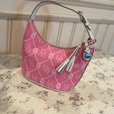 Beautiful New Without Tags Dooney And Bourke Pink Handbag Bought It For My Daughter But It’s Still Sitting In The Closet So Decided To List It Dooney And Bourke Handbags, Cream Handbag, Dooney And Bourke Disney, Pink Handbag, Disney Dooney, Handbag Essentials, Small Coin Purse, Barrel Bag, Pink Handbags