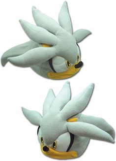 two sonic the hedgehog stuffed animals sitting next to each other in front of a white background