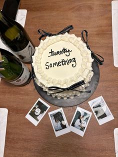 there is a cake on the table with wine bottles and pictures around it that say, tummy something