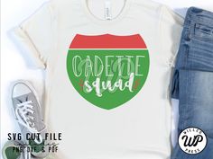 a t - shirt with the words caddiet squad in green and red on it