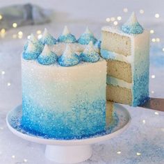 a cake with blue and white frosting on it