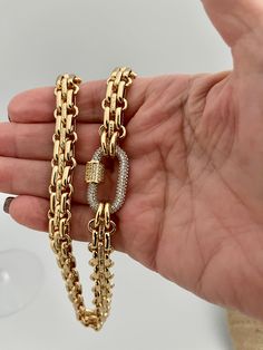 This is a show stopping necklace. Shiny gold, electroplated brass, multilink textured chain with a gorgeous oval pave carabiner with a pave screw lock. Choose 1 of 4 pave carabiners #1 Gold with a gold screw #2 Silver with a silver screw #3 Gold with a silver screw #4 Silver with a gold screw Mixed metal colors and material have become a big fashion statement. The chain is lead safe and nickel free. The chain is 11mm wide , chunky and thick. Great weight and sits beautifully around the neck. The Necklace Carabiner, Carabiner Necklace, Hand Knotted Necklace, Brass Texture, Gold Necklace Designs, Chunky Necklace, Big Fashion, Vintage Jewels, Gold Brass