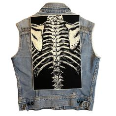 "Ribcage Cotton Canvas BACK Patch Artwork by Comic book writer/artist, Nat Jones Printed on off-white Classic Cotton Canvas 100% Cotton Weight: 275g/m2 Raw Cut (you can cut to desired size/shape) Comes in two sizes: REG: Measures about: 16.25 inches Tall, 10.75\" Wide XL: Measures about: 19 inches Tall, 12.5\" Wide Smooth, even surface texture. Moderate structure. Very durable fabric that can be used for high use projects in natural fibers. Care Reactive inks are permanent. Due to some residual ink from the print process, for first washing wash alone with a full load setting in cold water. Add a mild detergent, 1 cup vinegar and 2 tsp salt. For future washes, machine wash cold water with a phosphate free detergent. Machine dry on high heat. Iron on cotton setting or medium to high heat. Ex Ribcage Skeleton, Lovers Skeleton, Skeleton Lovers, Comic Book Writer, Punk Patches, Cat Patch, Battle Jacket, Book Writer, Clothing Patches