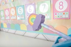 a close up of a child's toy with numbers on the wall behind it