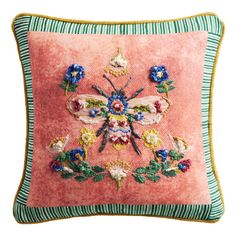 a pink pillow with flowers on it