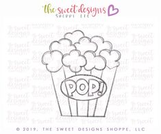 the sweet designs shoppe logo is shown in front of a cupcake with popcorn on it