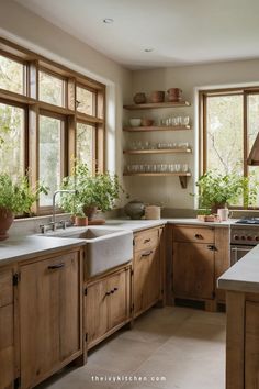 a kitchen filled with lots of wooden cabinets and counter top space next to large windows