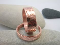 "MORE DESIGNS from ARKETIPO handmade jewelry can be found here: http://www.etsy.com/shop/ARKETIPO *THE PRICE IS FOR BOTH RINGS* These rings are HANDMADE entirely by myself in my workshop. Made from copper, designed, hammered and crafted by hand. The first ring is approximately 7mm wide and 1mm thick and the second one is 4mm wide and 1mm thick (if you want them more or less wide please firstly contact with me). You can choose words or numbers to be engraved inside of the ring ( choose the font t Copper Ring Jewelry For Anniversary, Handmade Rose Gold Ring For Anniversary, Rose Gold Copper Jewelry For Anniversary, Anniversary Rose Gold Copper Jewelry, Round Copper Jewelry For Anniversary, Rose Gold Copper Ring For Anniversary, 15 Rings, Wedding Rings Set, Handmade Rose