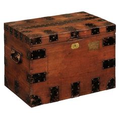 an old wooden trunk with metal handles and rivets on the sides, isolated against a white background