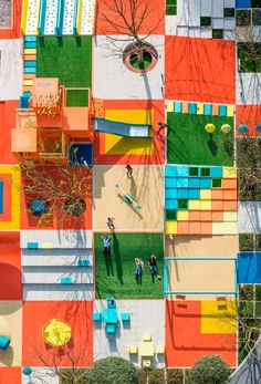 an aerial view of colorfully painted playgrounds