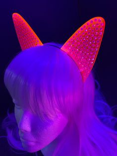 --==TIME TO GET YOUR BLING ON==--Elevate your rave or EDC outfit with these stunning Pavé Rhinestone Fluorescent Neon Cat Ears! Not only do they add a touch of cyberpunk flair, but they also glow in blacklight, making you stand out in any party or festival. Be the center of attention and let your inner feline shine! These Pavé Rhinestone Fluorescent Neon Cat Ears are made from 3mm cast acrylic which is laser engraved (each rhinestone circle) and laser cut. They are attached to a metal headband a Punk Style Cat Ear Party Accessories, Punk Cat Ears Costume Accessories For Party, Punk Style Cat Ears Costume Accessories For Party, Fitted Rave Costume Accessories For Party, Rave Halloween Party Costume Accessories, Fitted Cat Ears Costume Accessories For Party, Novelty Light-up Costume Accessories For Party, Cat Ears Costume Accessories For Halloween Party, Fantasy Cat Ears Costume Accessories For Party