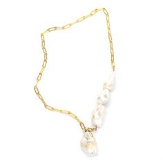 This one's a stunner. Asymmetrical style necklace featuring four sculptural AAA grade cultured baroque pearls that can be worn multiple ways. Adjust the clasp and you can wear it as a drop necklace, dramatic choker with long drop, or wrap it a few times around your wrist for an effortlessly cool bracelet. 14k gold filled. 24" long Single Strand Baroque Pearl Briolette Jewelry, Pearl Lariat Chain Jewelry, Lariat Necklace With Baroque Pearl Chain, Pearl Lariat Jewelry With Chain Detail, Pearl Lariat With Chain Detail Jewelry, Pearl Lariat Necklace With Chain, Baroque Pearl Lariat Necklace With Pearl Charm, Baroque Pearl Pendant Choker, Baroque Pearl Drop Long Necklace