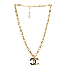 This is an authentic CHANEL Metal Enamel Quilted CC Chain Necklace Pendant in Black and Gold. This necklace is below the collar length and features a gold and black weave enamel textured Chanel CC logo. Chanel Necklace, Black Weave, Chanel Jewelry, Pendant Gold, Cc Logo, Gold Pendant Necklace, Necklace Pendant, Black And Gold, Gold Black