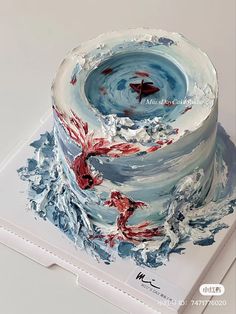 a cake with red and blue frosting on it