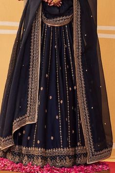 Navy blue attached cancan lehenga with dori, aari, sequin, cutdana, bead embroidery in stripe pattern. Paired with sleeveless embroidered padded blouse and dupatta. - Aza Fashions Stripes Pattern, Aza Fashion, Beaded Embroidery, Lehenga, Navy Blue, V Neck, Embroidery, Blue, Pattern