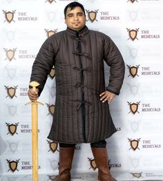 Medieval Gambeson thick padded coat Aketon vest Jacket Armor COSTUMES DRESS SCA BEST FITTING: Refer to the size chart to find a perfect fitting Gambeson Coat for yourself. CUSTOM DESIGN: We offer customization in size, design, Materials, colors , thickness, padding, button, laces or other aspects via merchant orders only. MATERIAL: The Gambeson coat is made of high-quality cotton fabrics. It has raw cotton pads and cotton linen for added comfort, breathability, and durability. AVEALABLE FINISH: Medieval Fitted Winter Outerwear, Medieval Style Outerwear With Buttons For Fall, Medieval Style Fitted Long Sleeve Outerwear, Fitted Medieval Style Long Sleeve Outerwear, Fitted Medieval Long Sleeve Outerwear, Medieval Fall Outerwear With Buttons, Medieval Style Fall Outerwear With Buttons, Viking Style Outerwear For Medieval Festivals Cosplay, Medieval Style Outerwear For Cosplay With Buttons