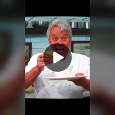 an old man holding a plate with food on it and making a funny face at the camera