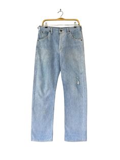 J9 Vintage 90s Lee Light Blue Jeans Lee Zipper Fly Denim Distressed Non Selvedge Faded Wash Jeans Lee Straightcut Classic Fit Lee Riders  Size on Tag :  Details Measurement  Waist : 31'inches Inseam : 32.5'inches Leg Opening : 17'inches Front Rise : 12'inches Thigh : 26'inches Knee : 18'inches Outseam (Length) : 44'inches Hips : 42'inches Condition :  Great Condition.Minor stains defect,discoloration and holes please refer pictures detail.‼️ 📮 SHIPING > WE ARE USING DHL EXPRESS SHIPING ITS TAKE 3-5 ARRIVE.PLEASE DROP YOUR PHONE NUMBER AFTER PURCHASE.📮 Ralph Lauren 90s, Ralph Lauren Pullover, Mom Sweater, Crew Neck Tshirt, Faded Jeans, Vintage Crewneck, Japanese Streetwear, Selvedge Denim, Light Blue Jeans