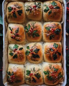 christmas rolls in a baking pan with holly decorations