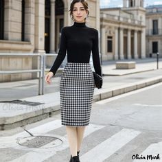 Olivia Mark - Premium Thickened Woolen Midi Skirt in Classic Houndstooth Pattern, Accentuating your Silhouette Houndstooth Pencil Skirt For Work, Fitted Black Houndstooth Skirt, Black Fitted Houndstooth Skirt, Fitted Black Skirt With Houndstooth Pattern, Houndstooth Skirt For Work, Fall Fitted Skirt With Houndstooth Pattern, Houndstooth Workwear Skirt, Houndstooth Skirt For Workwear, Cardigan With Shorts