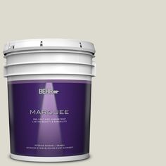 a bucket of marquee paint on a purple background with the words behrf marquee