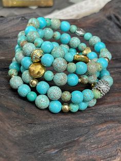 Spiral  Bracelet with Blue Turquoised beads, and yellow metal heart, pineapple beads. Hand made in Florida/USA.  Beads size  - 8 mm Ready to ship. Metal Bead Bracelet, Girls Crochet Hats, Black Rose Flower, Spiral Bracelet, Metal Heart, Florida Usa, Shoe Clips, Gem Stone, Beads Bracelet