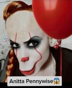 a woman with clown makeup holding a red balloon in front of her face and the caption reads, antita pennywise