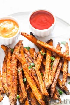 oven baked sweet potato fries on a plate with ketchup