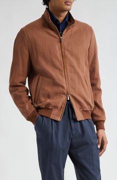 The midcentury-classic bomber jacket is refreshed in Loro Piana Solbiati heavy linen twill, a fabric that for all it's rugged looks has a comfortable softness. 28" length Two-way front-zip closure Mock neck Front zip pockets Ribbed cuffs and hem 100% linen Dry clean Made in Italy Designer Clothing Casual Unstructured Linen Outerwear, Brown Linen Casual Outerwear, Casual Linen Outerwear With Stand Collar, Casual Brown Linen Outerwear, Fall Linen Outerwear With Stand Collar, Casual Linen Outerwear With Pockets, Brown Relaxed Fit Linen Outerwear, Brown Linen Outerwear With Relaxed Fit, Modern Linen Outerwear For Fall