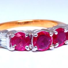 1.50ct Natural Rubies Ring. Round Brilliant Cut 4mm Each .25ct. Side Baguette Diamonds: H-Color Vs-2 Clarity. 18kt. Yellow Gold 7.1 Grams. Current Ring Size: 7 May Be Resized, Please Inquire. $4,000 Appraisal Certificate To Accompany Gia Certified Yellow Gold Ruby Ring For Anniversary, Gia Certified Baguette Cut Ruby Ring For Anniversary, Anniversary Yellow Gold Gia Certified Ruby Ring, Gia Certified Gold Ruby Ring With Round Cut, Gia Certified Gold Ruby Ring, Classic Yellow Gold Gia Certified Ruby Ring, Classic Yellow Gold Ruby Ring Gia Certified, Gia Certified Yellow Gold Ruby Ring With Round Cut, Baguette Diamonds