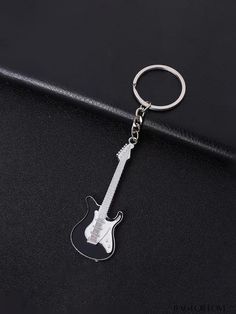 BagForLove - Premium Guitar Keychain - Ideal Gift for Music Enthusiasts Product Description Color Multicolor Pattern Type Colorblock Material Zinc Alloy Details Pictures Similar Products h2 { text-align: center; } /* æ¢è¡ */ li{ white-space: normal; word-break: break-all; word-wrap: break-word; } .red-box { width: 100%; display: flex; flex-direction: row; flex-wrap: wrap; justify-content: center; } .red-box > div { width: 190px; height: 250px; margin: 10px; } .red-box > div > a > img { width: 190px; height: 250px; } .size-box { width: 100%; margin: auto; white-space: nowrap; } .table { border-collapse: collapse; border-spacing: 0; width: 100%; table-layout: fixed; } tr, td, th { border: 1px solid rgb(175, 173, 173); padding: 10px 0px; text-align: center; font-size: 14px; box-sizing: bord Guitar Keychain, Guitar Gifts, Unique Guitars, Music Themed, Word Wrap, Pink Backpack, Car Keychain, Evening Clutch, Bag Set