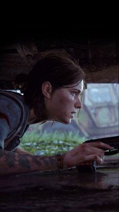 the last of us part 2 - screenshote with girl looking at something in her hand