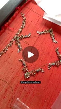 the video is showing how to make a chain bracelet with beads and chains on it