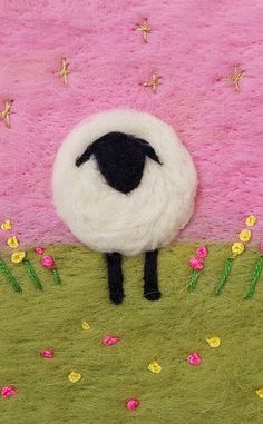 a sheep is standing in the grass with flowers on it's side and pink background